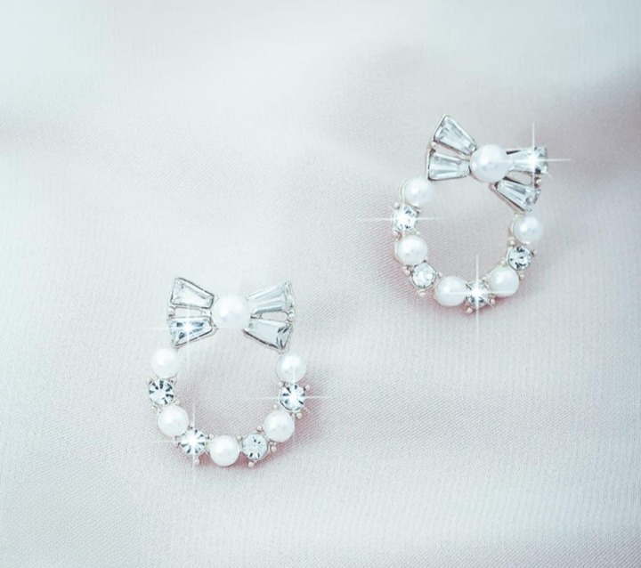 Pearl Bow Korean Zircon Earrings for Women ? Elegant Bowknot Design with Sparkling Zircon and Pearl Accents | Premium Golden and Silver Fashion Jewelry for Weddings, Parties, and Everyday Wear | AXT-100
