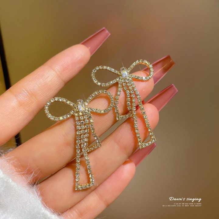 PQT-985 Touch Of Glamour To Your Look With These Bow Shape Zircon Korean Earrings ? Color Golden
